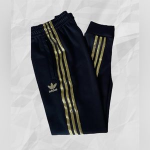 Mens adidas 50 year superstar anniversary track pants trio.